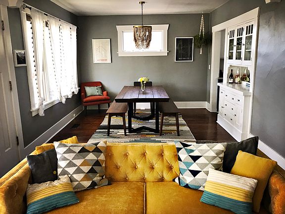 Living Room / Dinning Room open concept. Original hardwood floor, refurbished.