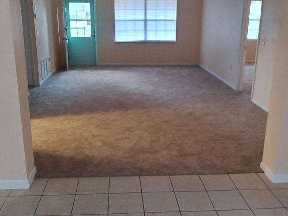 Front entrance through to den