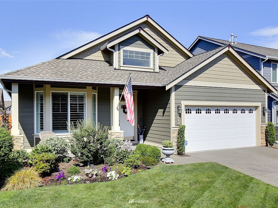 Front of home, you will love the landscaping all around this house. >