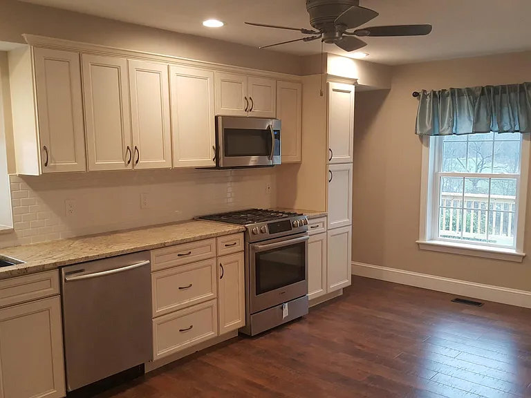 Updated kitchen with granite countertop