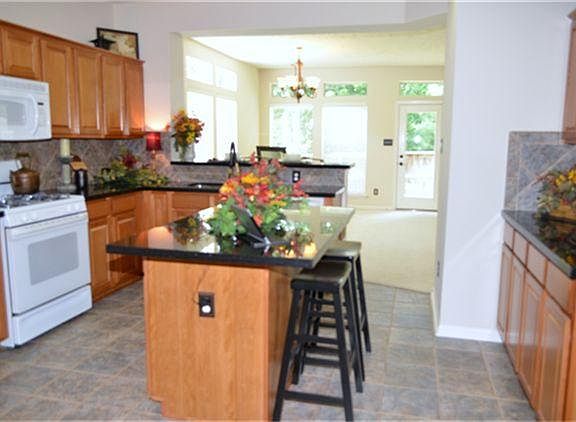 Great open view from the kitchen area to the dining/living room combo.
