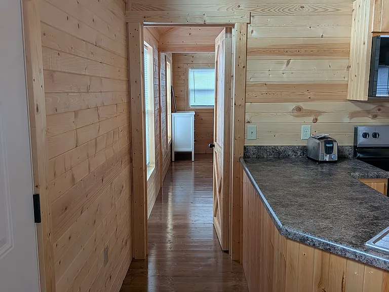 Hall to bathroom 1 and bedroom 1