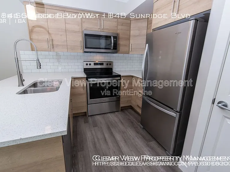 94 Sunridge Blvd W #LOWER LEVEL — Photo 3