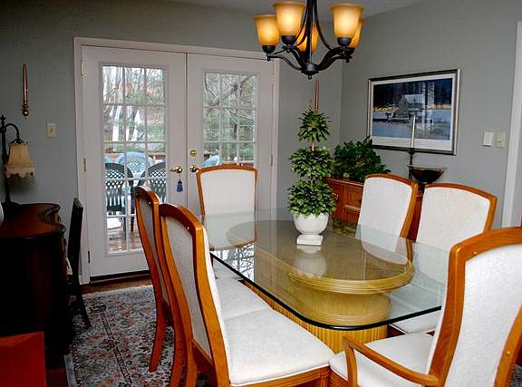 French doors open onto the rear deck.