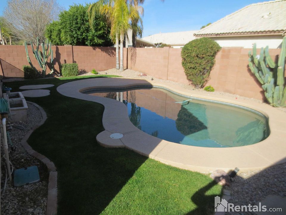 BACKYARD WITH POOL/GRASS/SAFETY GATE