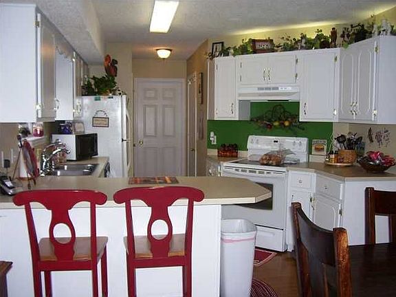 Kitchen (leads to laundry room and half bath)