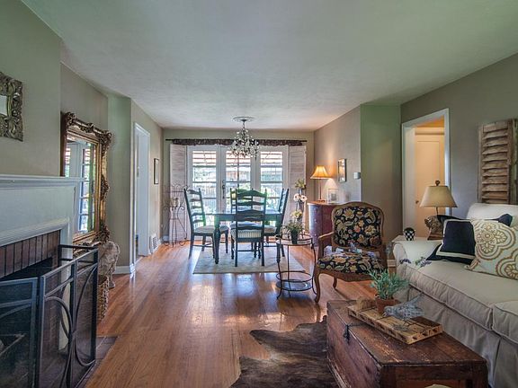 Living/Dining area. Wood burning fireplace.