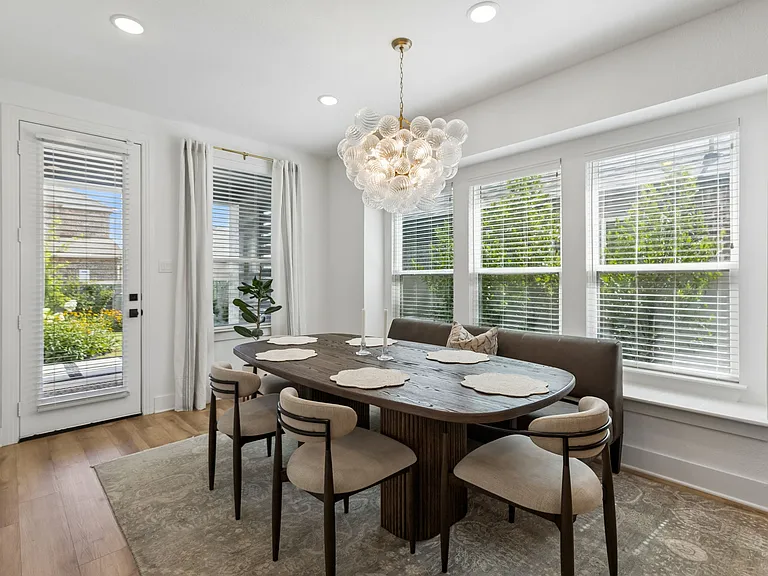Dining Room off kitchen with back door to patio.