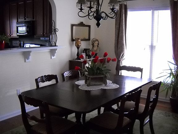 Extended bar shelf between kitchen and dining room, walls newly painted.