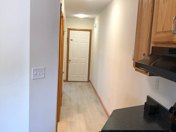 Looking from Kitchen down hallway towards living room