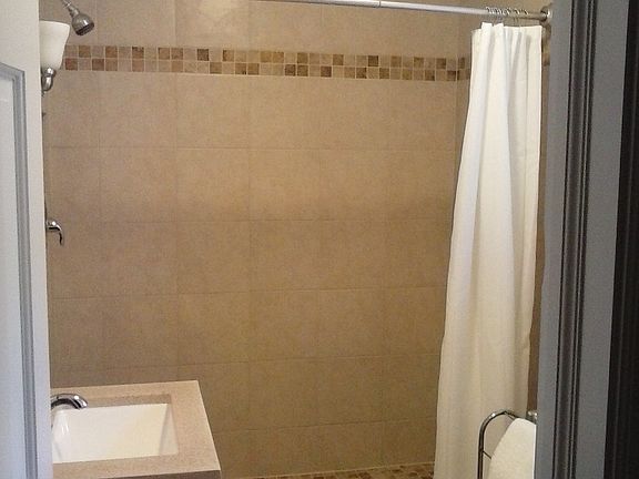 Down Stairs Tile Shower