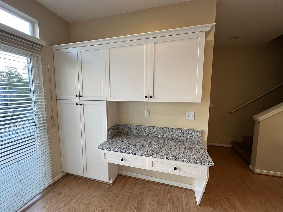 New granite countertops and freshly painted cabinets