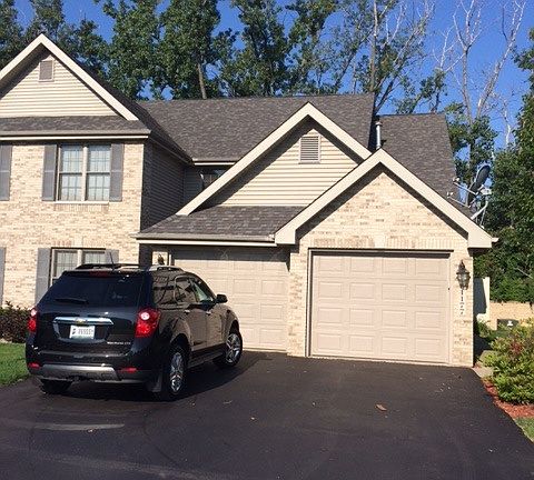 Exterior- upper level unit, 1 car garage