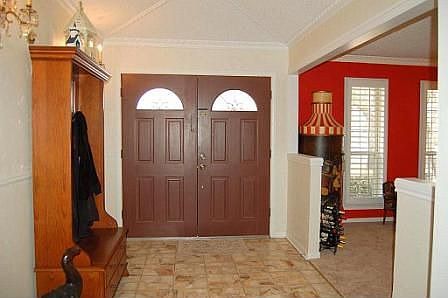 Welcoming entry with double doors
