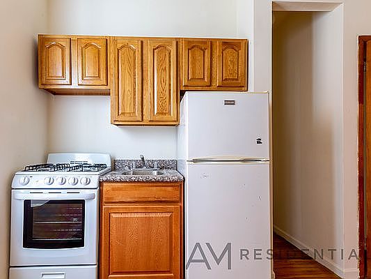 2nd image of 301 100th St APT 3B