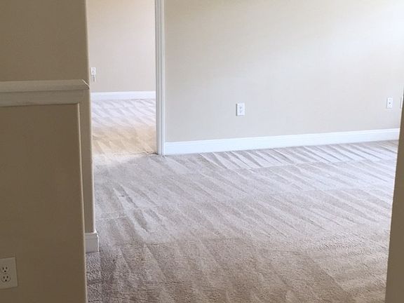 Entrance of apartment looking at living room