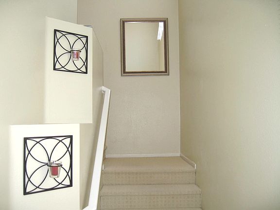 from garage or front door, this stair leads to the living fl