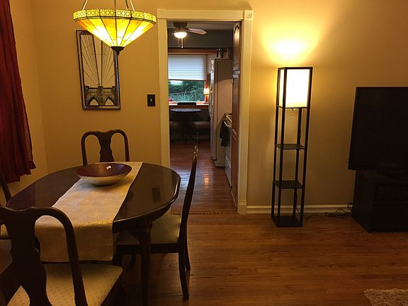 Dining and entry with Tiffany style Chandelier.