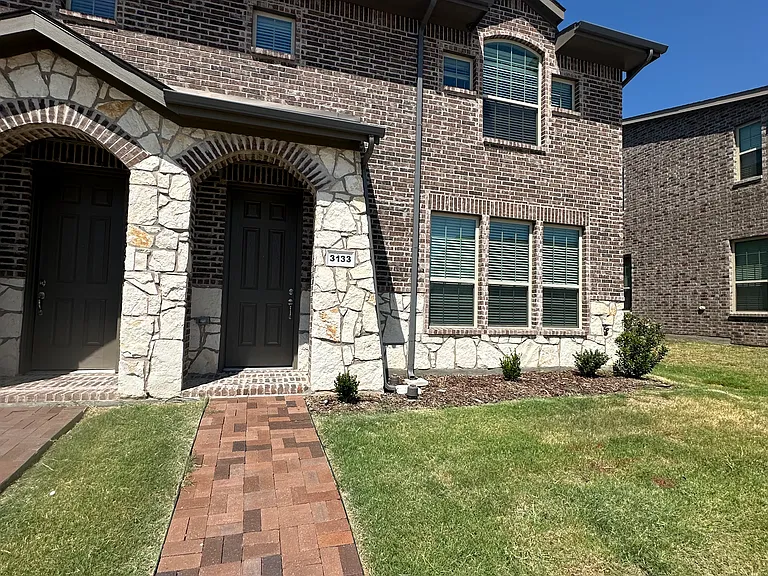 Curbside view! Beautiful sidewalks perfect for daily walks
