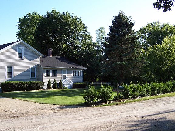 Front of second home, before new driveway.