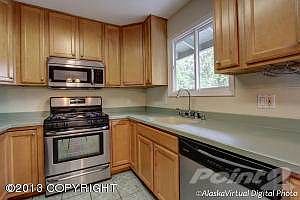 Maple cabinets, Corian tops, and . . .