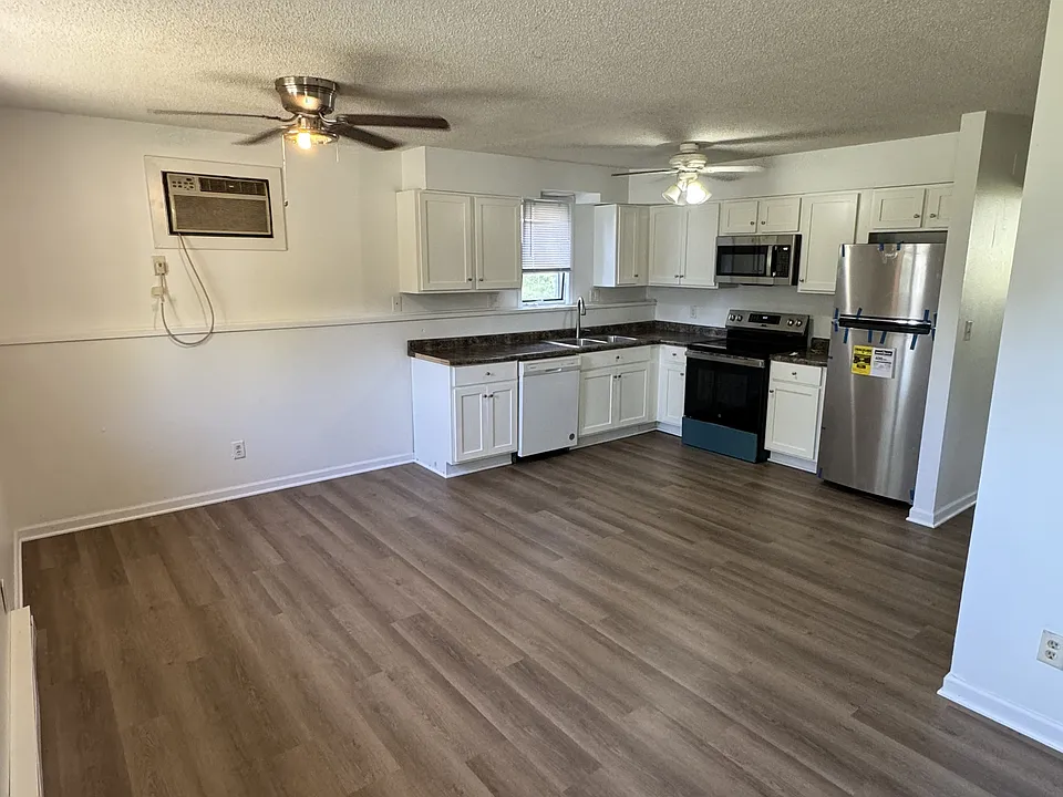 New flooring throughout the unit with 2 fans