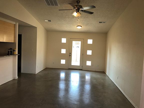 Sealed concrete floors. No carpet.