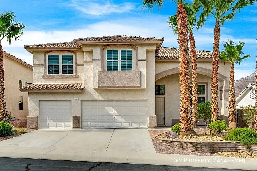 Exquisite 5 Bedroom Home in a Guard-Gated Henderson Community — Photo 1