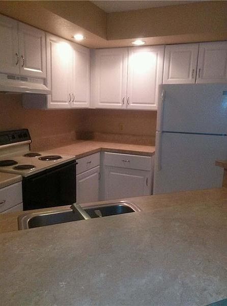 2nd image of 3430 Pinewalk Dr N APT 616