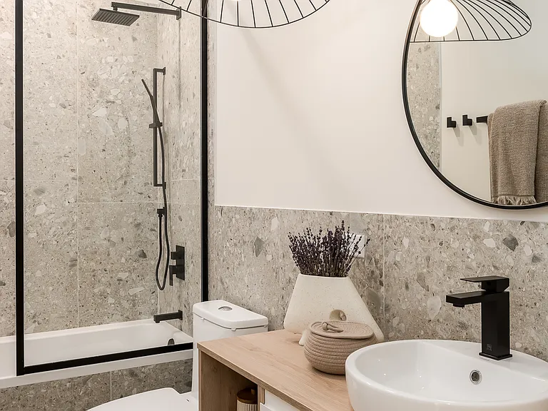 Secondary Bathroom with dual sink Vanity and Shower/Tub
