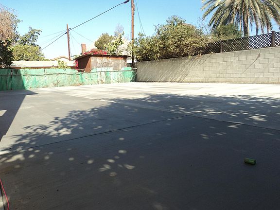 Concrete pad for parking in rear