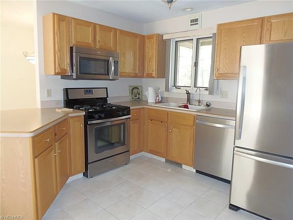 Kitchen with newer appliances.
