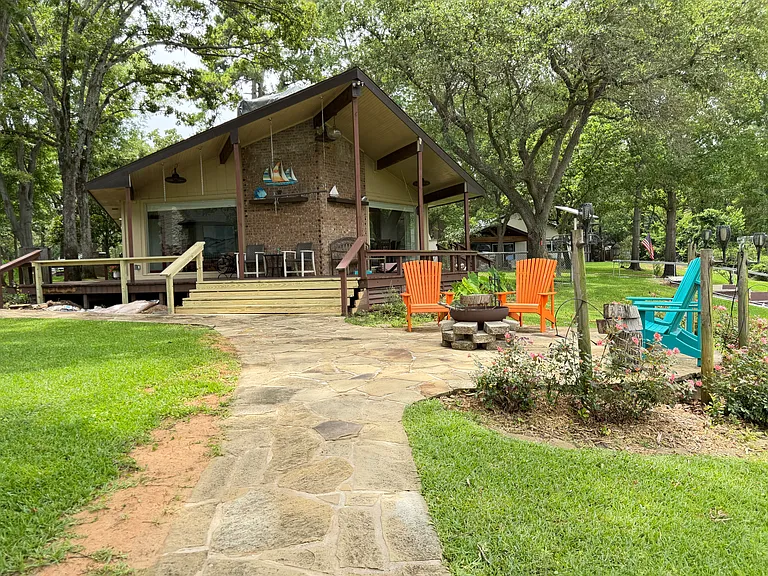 Plenty of seating areas with large covered patio and fire pit