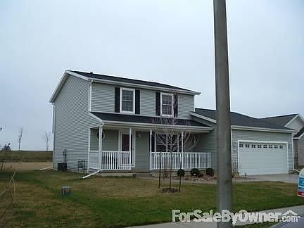 2 Story & 2 car garage with front porch and professional landscaping
