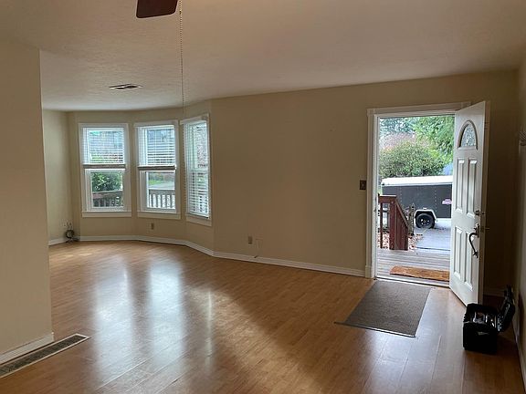 Living room to the right when you walk in front door.