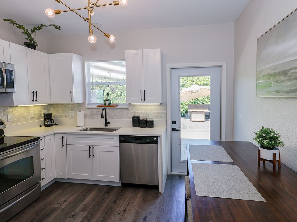 Enjoy the fully appointed kitchen with stainless steel appliances and a high top table for 4 plus a beautiful view of the back patio.