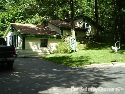 right side showing propane tank : this is viewing from the driveway