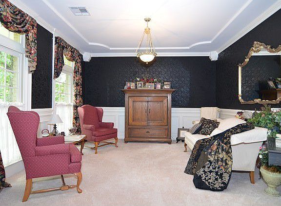 Stunning formal living with wainscoting 