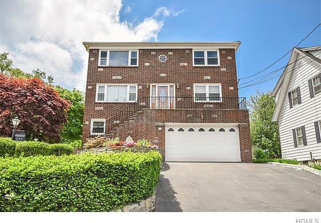 Immaculate brick multi-family located near all