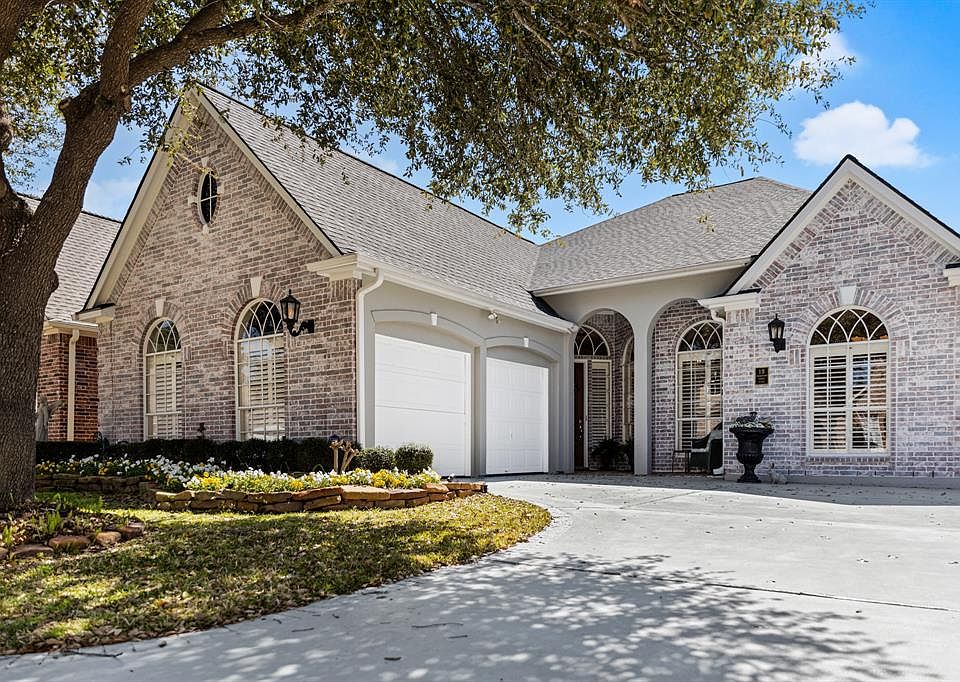 Remarkable one story home in gated community.