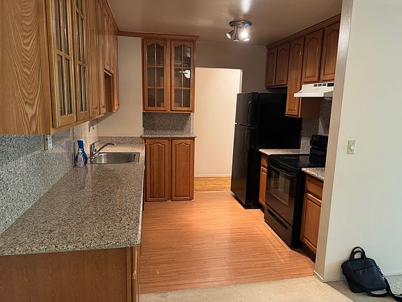 Kitchen off entry hallway.