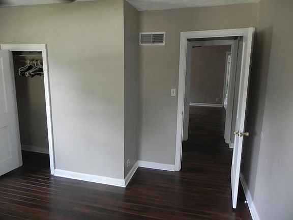 Front bedroom looking to hall and rear bedroom