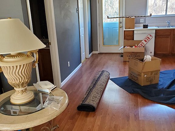 Picture shows 1/2 of open floor plan on main level.