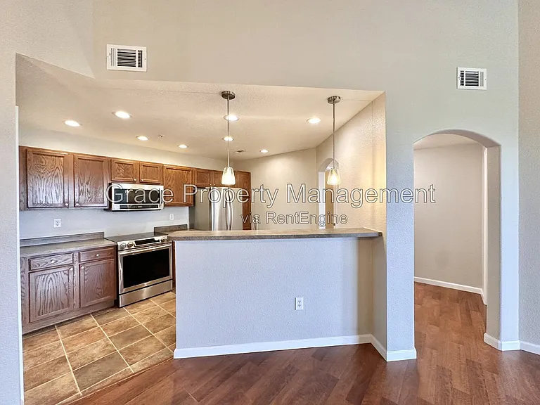 5735 N Genoa Way #306 — Photo 2