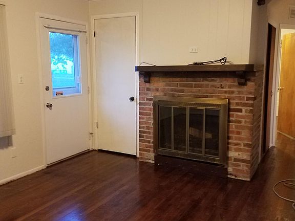 Living room, coming in front door. Electric Fireplace