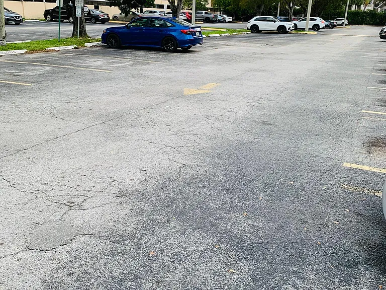 Condominium, Gated Parking Lot.