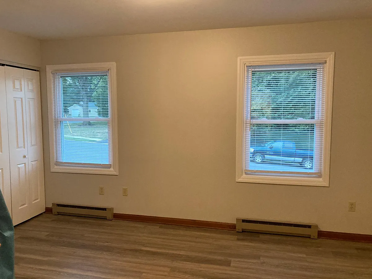 Bedroom #1 is spacious with good natural lighting and two sizeable closets. - 1260 S Mount Joy St