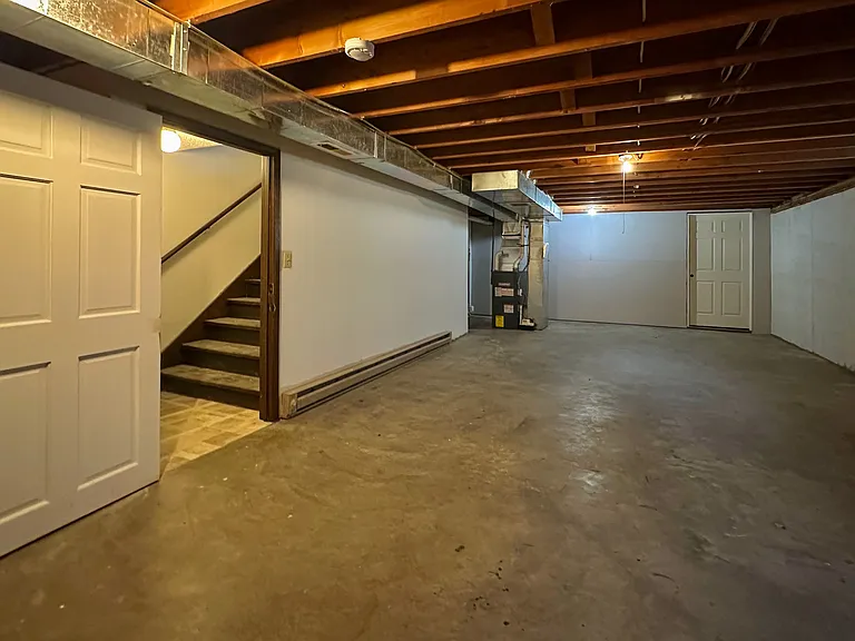 ~500 sq ft. basement area (space behind door on the right is not available for use).