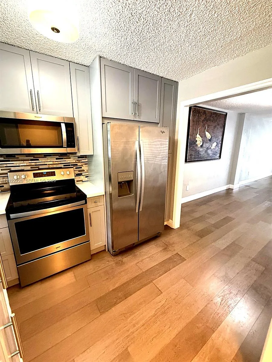 Building Photo - 1635 W 44th Pl #311