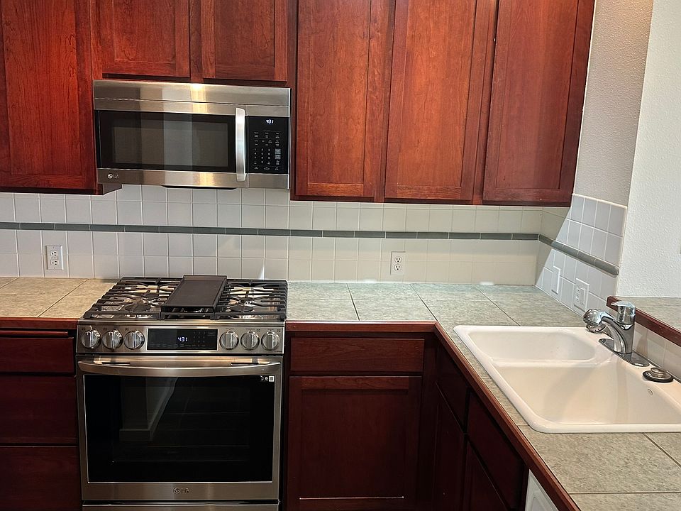 Kitchen has stove, microwave and refrigerator that were updated in 2023.